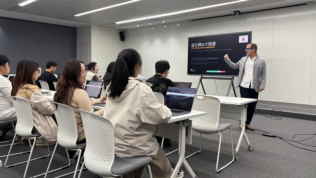 Nebojsa Visnjic teaching an AI masterclass to Dongfeng colleagues working on laptops